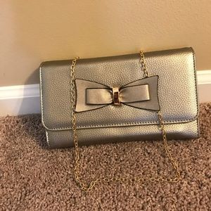 Silver crossbody bow tie purse